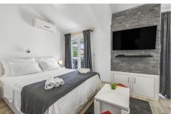 Vila s bazenom i jacuzzijima Apartmán 3: (2+1) - A3 foto 2